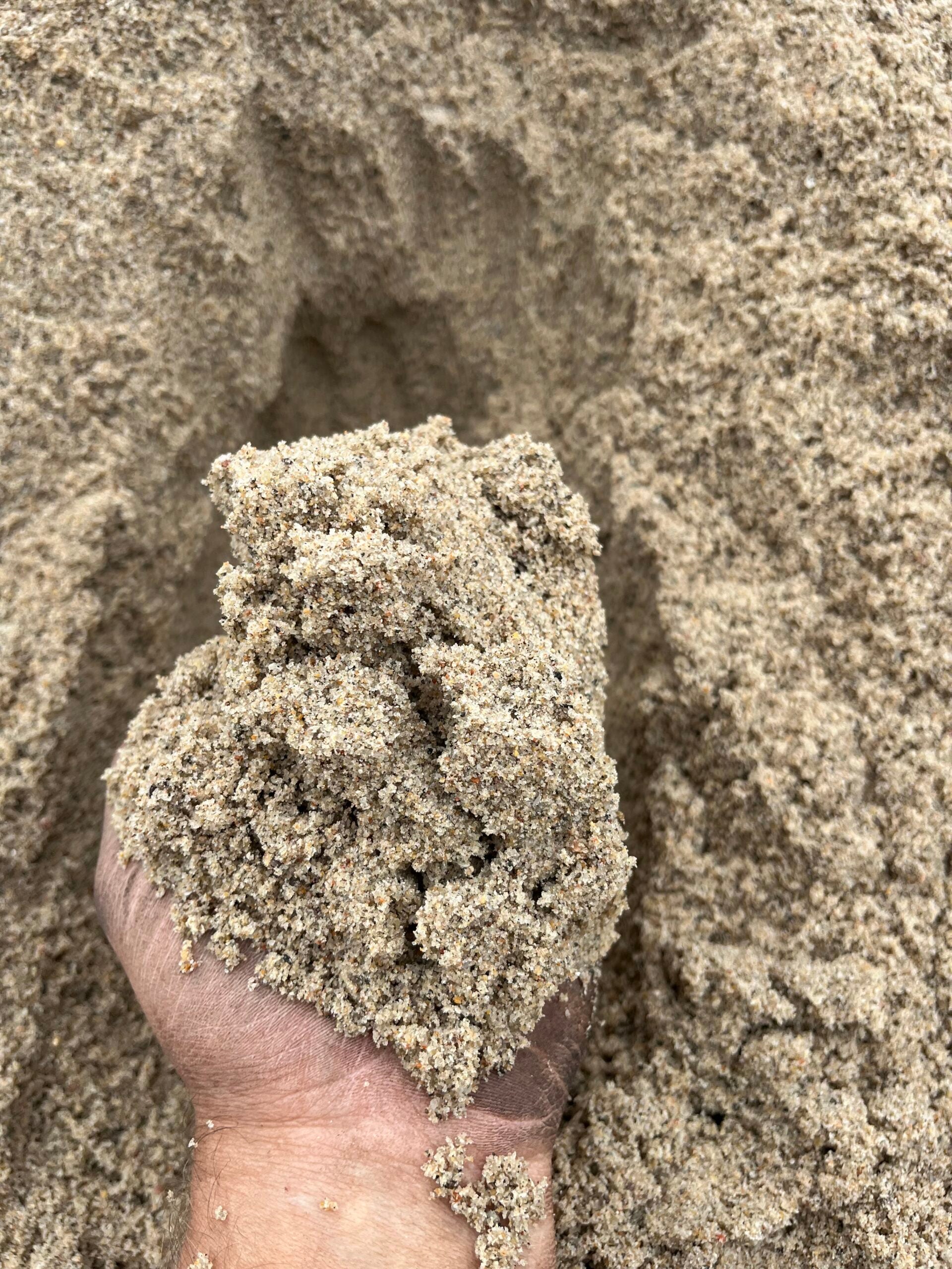 Vasket sand 0-4 mm i hånd